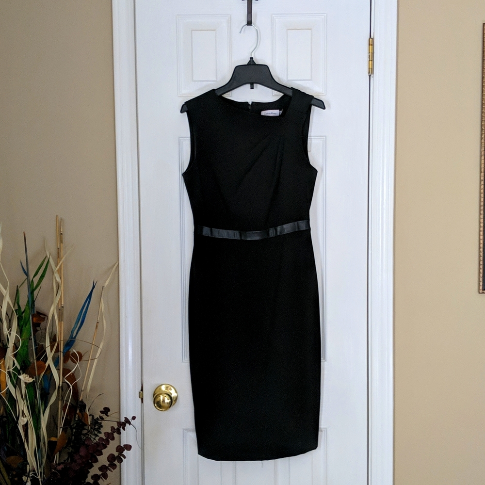 Dress By Calvin Klein size 2. Black with Black leather parts.